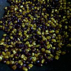 Mixing Corn Kernels with Spices for Popcorn